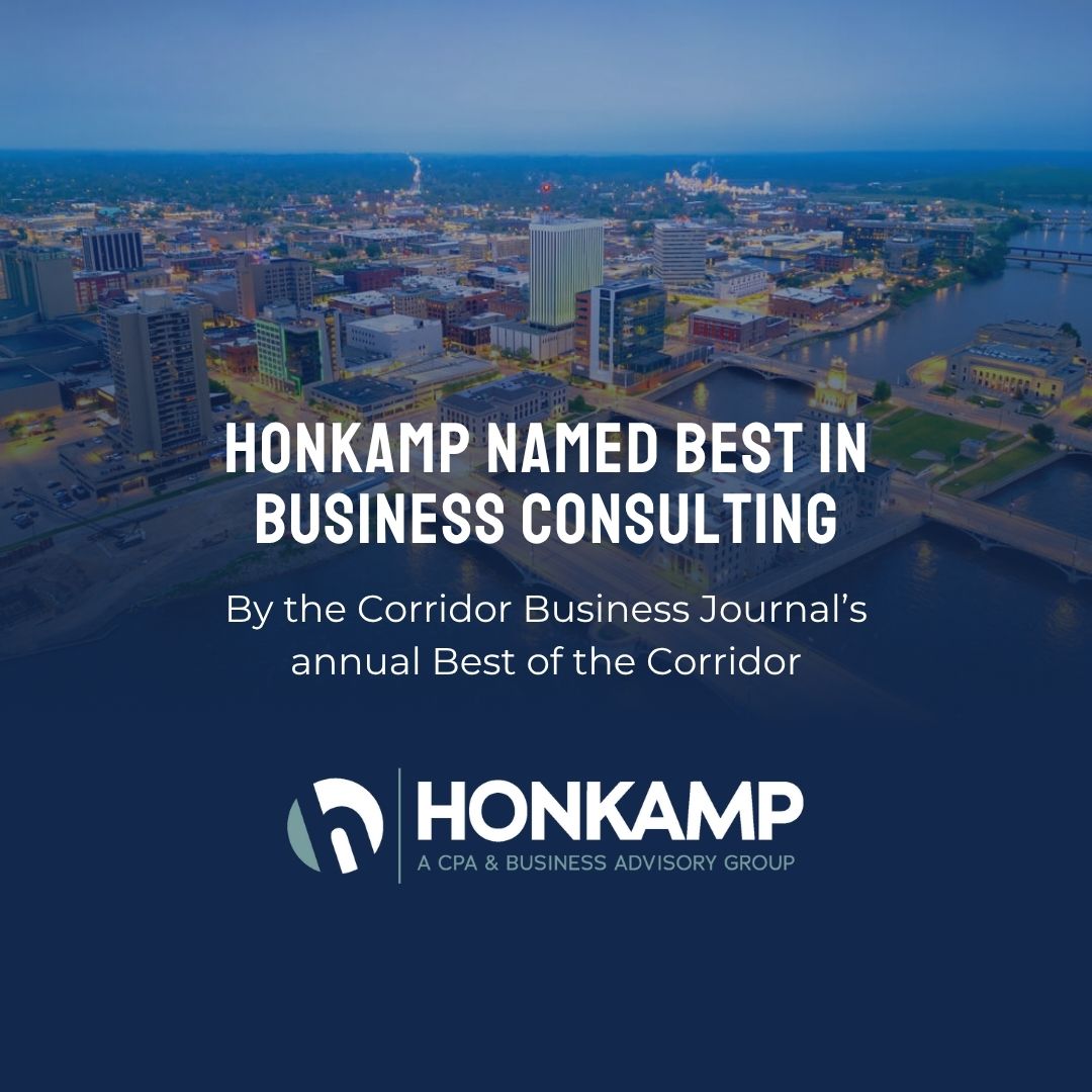 Overtop an aerial shot of a waterside city, text reads 