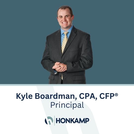 Smiling man in a blazer appears on a dark teal background. Text below reads 