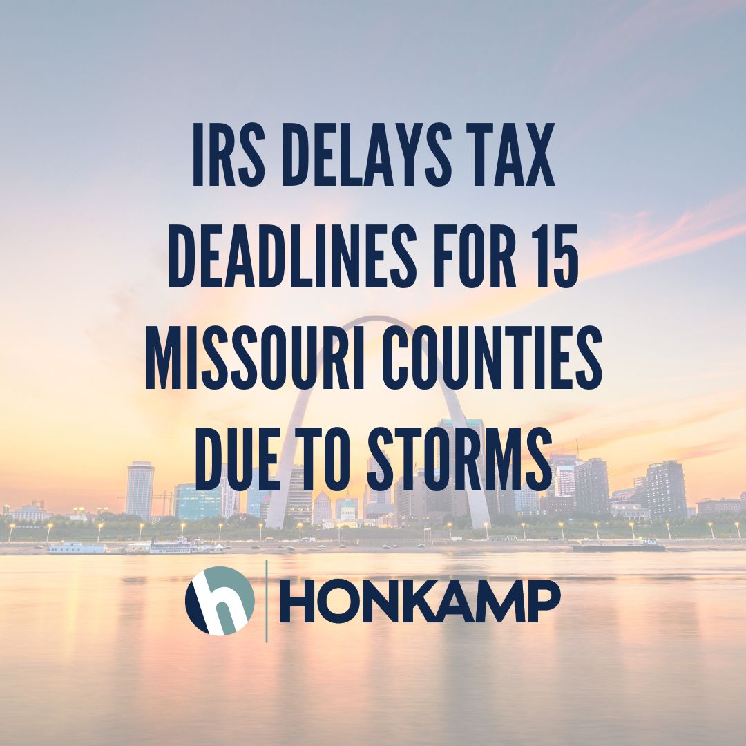 Overtop of an image of the St. Louis skyline, text reads "IRS Delays Tax Deadlines for 15 Missouri Counties Due to Storms" with the Honkamp logo