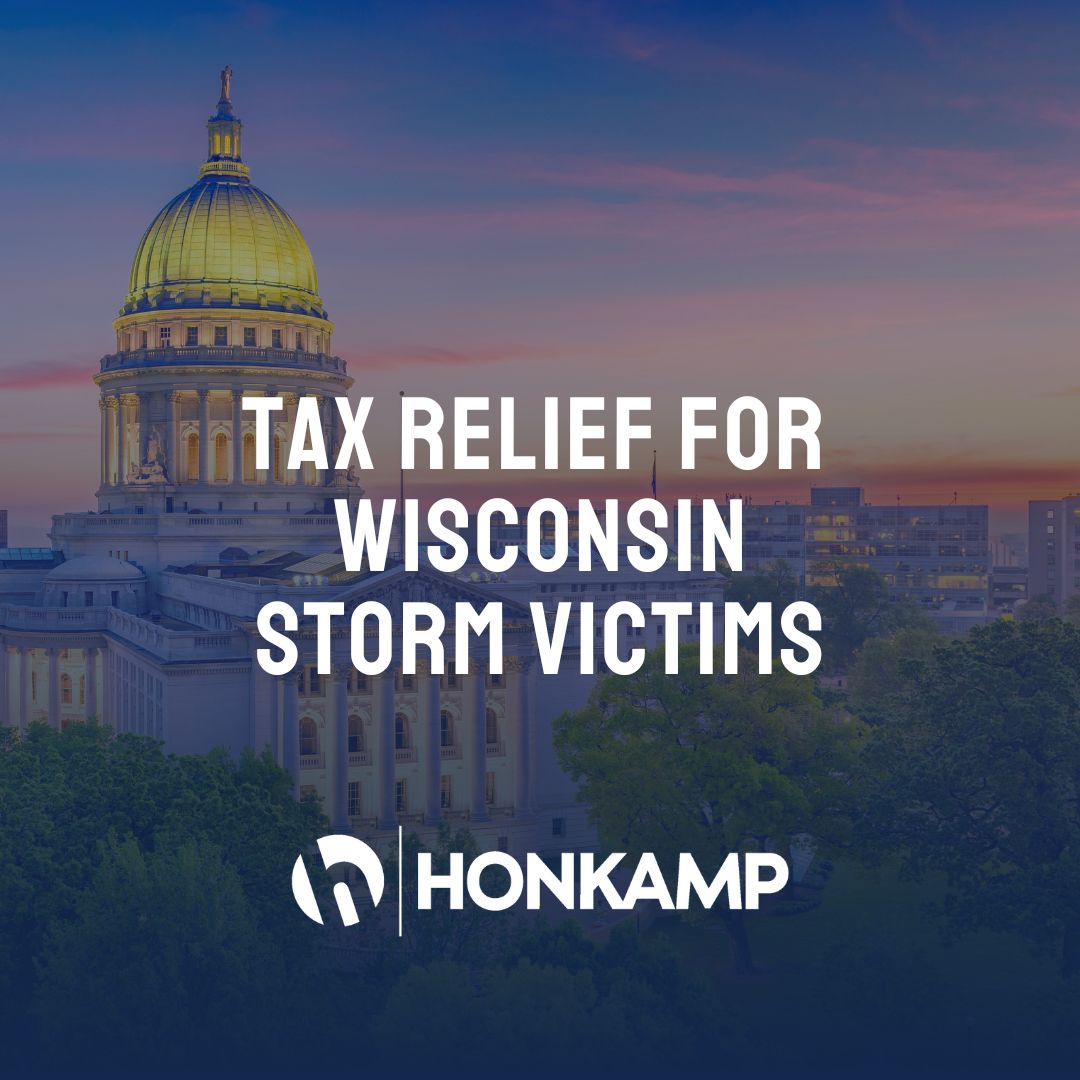 Overtop an aerial shot of the Wisconsin Capitol building, text reads 